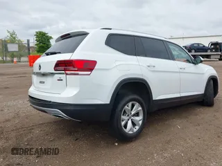 2019 Volkswagen Atlas SE with VIN 1V2UR2CA0KC560799, listed as a IAAI auction lot 42318671 with 95,804 mi miles and . Bid and sale history available at DreamBid. Image 4.