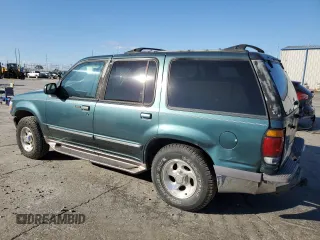 1997 Ford Explorer XL with VIN 1FMDU34E2VZC03015, listed as a Copart auction lot 80654764 with 295,587 mi miles and Salvage title. Bid and sale history available at DreamBid. Image 2.