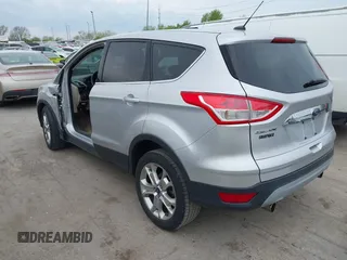 2013 Ford Escape SEL with VIN 1FMCU0HX1DUB81641, listed as a IAAI auction lot 42090788 with 111,496 mi miles and . Bid and sale history available at DreamBid. Image 3.