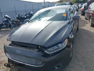 2015 Ford Fusion SE Hybrid with VIN 3FA6P0LUXFR266743, listed as a IAAI auction lot 40862039 with 116,610 mi miles. Bid and sale history available at carsss.com. Image 12.