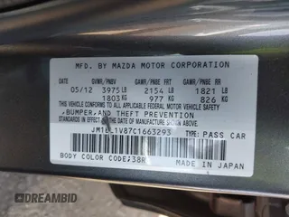 2012 Mazda 3 i Touring with VIN JM1BL1V87C1663293, listed as a IAAI auction lot 41963739 with 148,031 mi miles and . Bid and sale history available at carsss.com. Image 9.