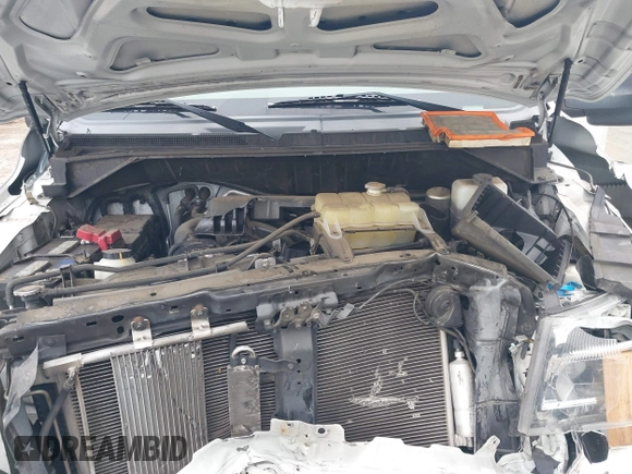 2021 Nissan NV Cargo SV z VIN 1N6BF0KYXMN805682, wystawiony jako IAAI lot #42152216 z przebiegiem 82 671 mil mil oraz . Historia ofert i sprzedaży dostępna na DreamBid. Obrazek 10.