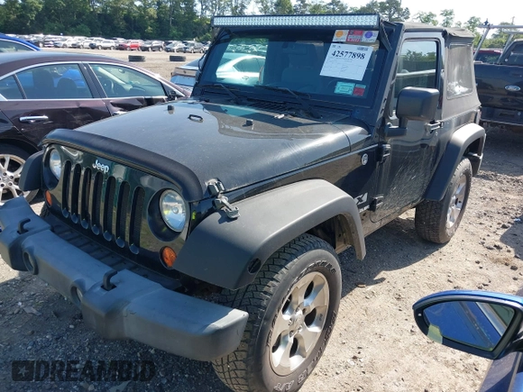 2009 Jeep Wrangler X with VIN 1J4FA24179L711352, listed as a IAAI auction lot 42577898 with 133,309 mi miles and . Bid and sale history available at DreamBid. Image 18.