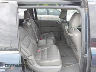 2009 Honda Odyssey EX-L with VIN 5FNRL38769B409281, listed as a IAAI auction lot 42013137 with 213,934 mi miles and . Bid and sale history available at DreamBid. Image 8.