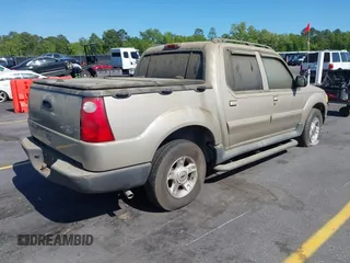 2004 Ford Explorer Sport Trac XLS z VIN 1FMZU67K24UA66100, wystawiony jako IAAI lot #42035953 z przebiegiem 217 105 mil mil oraz . Historia ofert i sprzedaży dostępna na DreamBid. Obrazek 4.