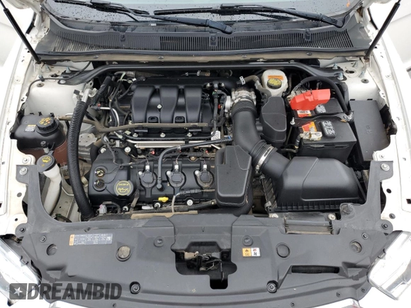2019 Ford Taurus SEL with VIN 1FAHP2E85KG102743, listed as a Copart auction lot 81892973 with 102,301 mi miles and Salvage Title. Bid and sale history available at DreamBid. Image 13.