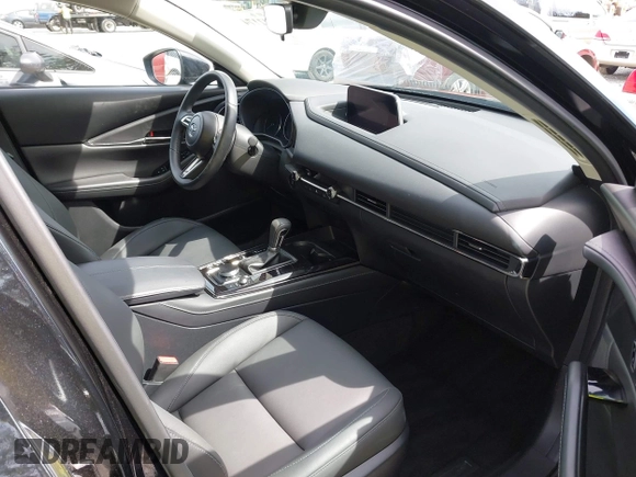 2023 Mazda CX-30 S Carbon Edition with VIN 3MVDMBCM3PM562447, listed as a IAAI auction lot 42174280 with 22,028 mi miles and . Bid and sale history available at DreamBid. Image 5.