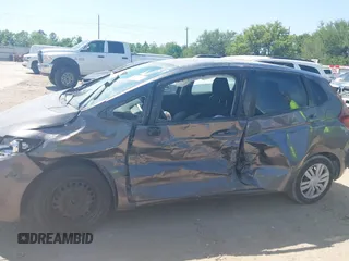2016 Honda Fit LX z VIN JHMGK5H56GX041075, wystawiony jako IAAI lot #42023299 z przebiegiem 145 658 mil mil oraz . Historia ofert i sprzedaży dostępna na DreamBid. Obrazek 6.
