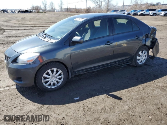 2012 Toyota Yaris with VIN JTDBT4K36CL028550, listed as a Copart auction lot 52071475 with 173,922 mi miles and Salvage Title. Bid and sale history available at DreamBid. Image 1.
