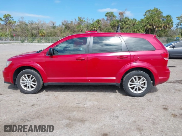 2015 Dodge Journey American Value z VIN 3C4PDCAB4FT679285, wystawiony jako IAAI lot #41600486 z przebiegiem 161 459 mil mil oraz . Historia ofert i sprzedaży dostępna na DreamBid. Obrazek 14.