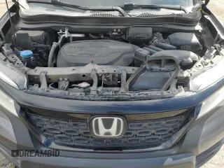 2020 Honda Passport Touring z VIN 5FNYF8H9XLB007336, wystawiony jako Copart lot #51012975 z przebiegiem 74 620 mil mil oraz Szkoda całkowita • Salvage title. Historia ofert i sprzedaży dostępna na DreamBid. Obrazek 12.