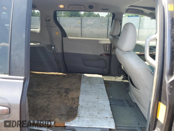 2012 Toyota Sienna XLE AAS with VIN 5TDYK3DC3CS237344, listed as a Copart auction lot 63271815 with 105,860 mi miles and Salvage title. Bid and sale history available at DreamBid. Image 11.