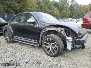 2018 Volkswagen Beetle Dune with VIN 3VWSD7AT4JM709024, listed as a Copart auction lot 73713754 with 50,879 mi miles and Salvage Title. Bid and sale history available at carsss.com. Image 4.