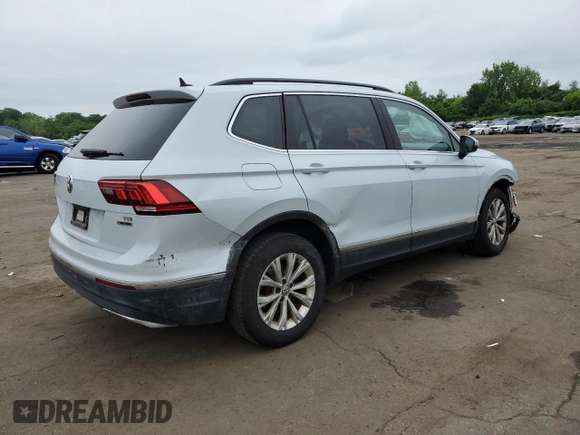 2018 Volkswagen Tiguan SEL with VIN 3VV2B7AX3JM185619, listed as a Copart auction lot 59421195 with 164,431 mi miles and Salvage title. Bid and sale history available at DreamBid. Image 3.