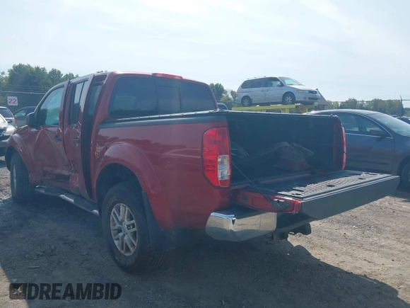 2015 Nissan Frontier Pro-4X with VIN 1N6AD0EV2FN721636, listed as a IAAI auction lot 40310184 with 132,897 mi miles and . Bid and sale history available at DreamBid. Image 3.
