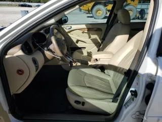 2007 Jaguar X-Type z VIN SAJWA51A67WJ24665, wystawiony jako Copart lot #86817544 z przebiegiem 52 027 mil mil oraz Szkoda całkowita • Salvage title. Historia ofert i sprzedaży dostępna na DreamBid. Obrazek 7.