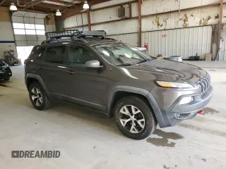 2014 Jeep Cherokee Trailhawk with VIN 1C4PJMBS6EW188531, listed as a Copart auction lot 50548105 with 108,081 mi miles and Salvage Title. Bid and sale history available at carsss.com. Image 4.