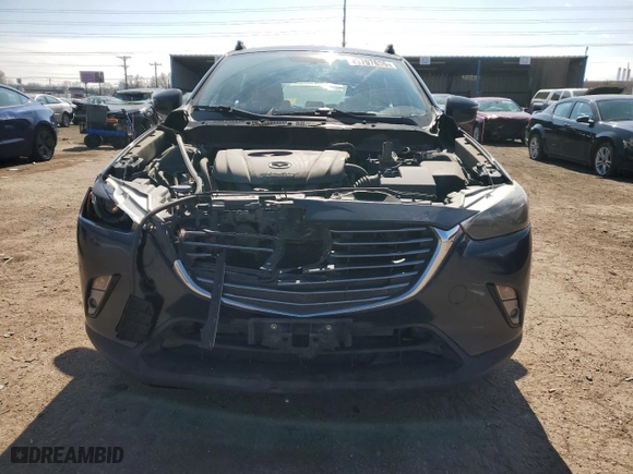 2016 Mazda CX-3 Grand Touring with VIN JM1DKFD79G0134716, listed as a Copart auction lot 45707635 with 123,034 mi miles and Salvage Title. Bid and sale history available at carsss.com. Image 5.