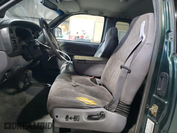 2000 Dodge 1500 z VIN 3B7HF13Z0YG125699, wystawiony jako Copart lot #78959104 z przebiegiem Nie podano mil oraz Szkoda całkowita • Salvage title. Historia ofert i sprzedaży dostępna na DreamBid. Obrazek 7.