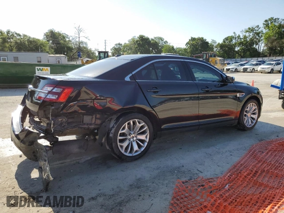 2017 Ford Taurus Limited with VIN 1FAHP2F84HG111702, listed as a Copart auction lot 54694325 with 114,533 mi miles and Salvage Title. Bid and sale history available at DreamBid. Image 3.
