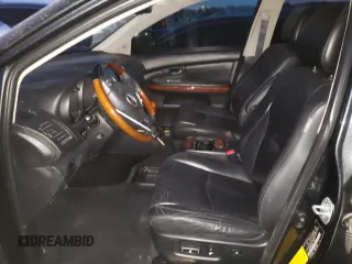 2007 Lexus RX 400h z VIN JTJGW31U172005381, wystawiony jako Copart lot #85118324 z przebiegiem 145 757 mil mil oraz Szkody całkowita. Historia ofert i sprzedaży dostępna na DreamBid. Obrazek 7.