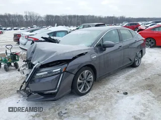 2018 Honda Clarity z VIN JHMZC5F13JC006627, wystawiony jako IAAI lot #41335364 z przebiegiem 58 662 mil mil oraz . Historia ofert i sprzedaży dostępna na DreamBid. Obrazek 17.
