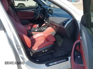 2021 BMW X4 xDrive30i z VIN 5UX2V1C01M9F26524, wystawiony jako IAAI lot #41805153 z przebiegiem 40 353 mil mil oraz . Historia ofert i sprzedaży dostępna na DreamBid. Obrazek 5.