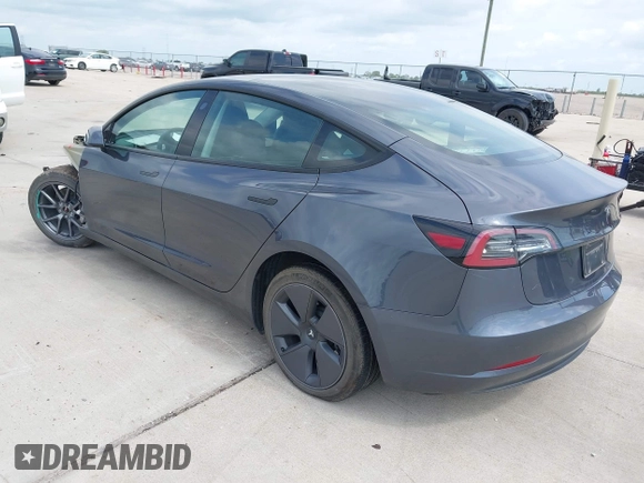 2023 Tesla Model 3 with VIN 5YJ3E1EA7PF417293, listed as a IAAI auction lot 42407659 with 22,578 mi miles and . Bid and sale history available at DreamBid. Image 3.