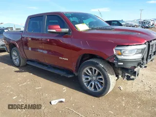 2021 Ram 1500 Laramie z VIN 1C6SRFJT2MN525409, wystawiony jako IAAI lot #41812552 z przebiegiem 51 138 mil mil oraz . Historia ofert i sprzedaży dostępna na DreamBid. Obrazek 1.