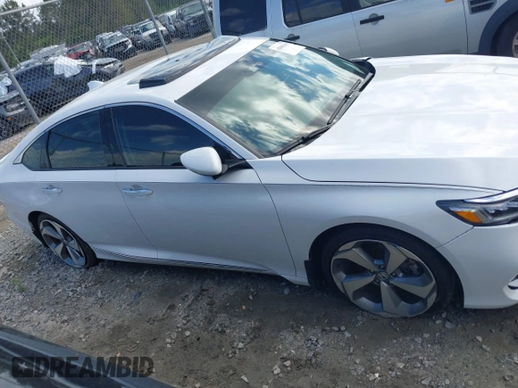 2019 Honda Accord Touring with VIN 1HGCV2F96KA009252, listed as a IAAI auction lot 42003043 with 76,249 mi miles and . Bid and sale history available at DreamBid. Image 13.