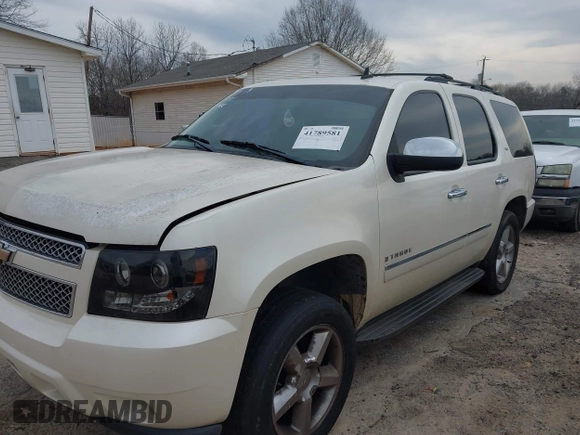 2009 Chevrolet Tahoe LTZ z VIN 1GNFK33089R218771, wystawiony jako IAAI lot #41789581 z przebiegiem 209 247 mil mil oraz . Historia ofert i sprzedaży dostępna na DreamBid. Obrazek 22.