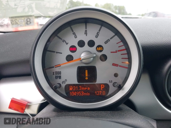 2010 MINI Hardtop S with VIN WMWMF7C55ATW88946, listed as a IAAI auction lot 42443200 with 104,953 mi miles and . Bid and sale history available at DreamBid. Image 7.