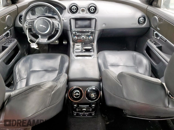 2015 Jaguar XJ with VIN SAJWA1CZ8F8V85381, listed as a Copart auction lot 57464225 with 161,938 mi miles and Salvage Title. Bid and sale history available at DreamBid. Image 8.