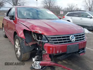 2016 Volkswagen Passat S with VIN 1VWAT7A38GC011797, listed as a IAAI auction lot 41227670 with 128,238 mi miles and . Bid and sale history available at DreamBid. Image 1.