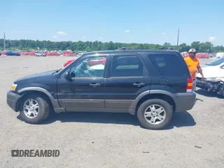 2005 Ford Escape XLT with VIN 1FMCU93115KE48930, listed as a IAAI auction lot 42592931 with 180,260 mi miles and . Bid and sale history available at DreamBid. Image 13.