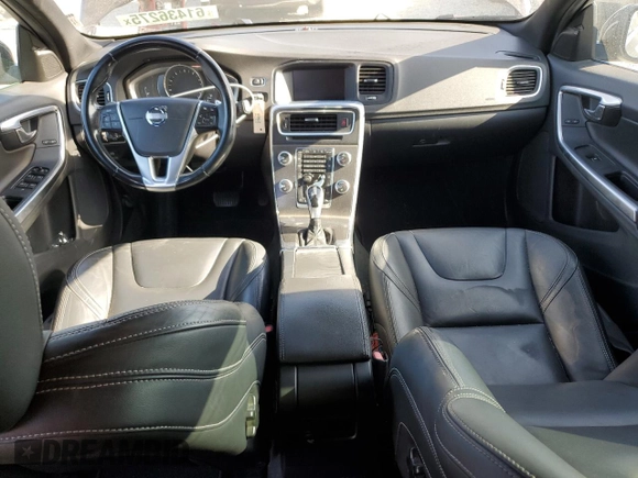 2015 Volvo S60 T5 Drive-E Premier z VIN YV126MFK6F2334600, wystawiony jako Copart lot #61436275 z przebiegiem 117 878 mil mil oraz Czysty tytuł • Clean title. Historia ofert i sprzedaży dostępna na DreamBid. Obrazek 8.