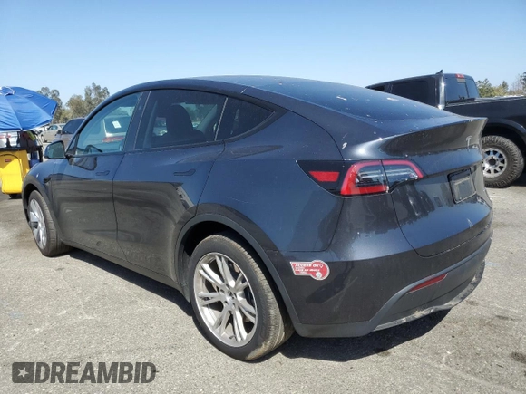 2024 Tesla Model Y Long Range z VIN 7SAYGDEE2RA223052, wystawiony jako Copart lot #61485025 z przebiegiem 13 268 mil mil oraz Szkoda całkowita • Salvage title. Historia ofert i sprzedaży dostępna na DreamBid. Obrazek 2.