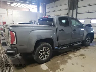 2021 GMC Canyon 4WD AT4 z VIN 1GTG6FEN1M1203936, wystawiony jako Copart lot #56041315 z przebiegiem 54 939 mil mil oraz Szkoda całkowita • Salvage title. Historia ofert i sprzedaży dostępna na DreamBid. Obrazek 3.