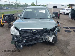 2015 Subaru Forester Touring with VIN JF2SJAWC9FH561581, listed as a IAAI auction lot 42237512 with 109,210 mi miles and . Bid and sale history available at DreamBid. Image 12.