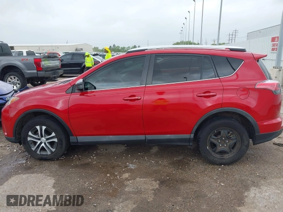 2016 Toyota RAV4 LE with VIN 2T3ZFREV4GW252399, listed as a IAAI auction lot 41955913 with 159,830 mi miles and . Bid and sale history available at carsss.com. Image 14.