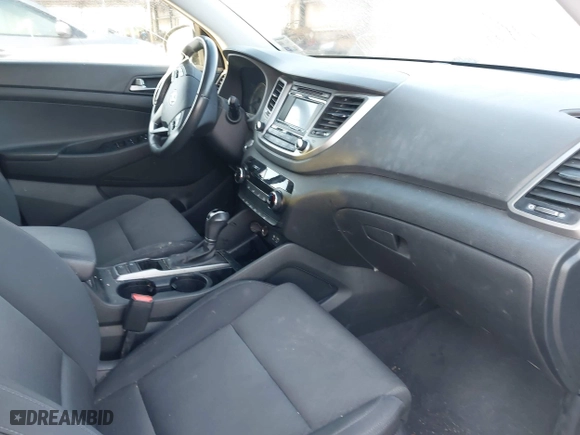 2017 Hyundai Tucson Value with VIN KM8J33A2XHU462806, listed as a IAAI auction lot 42045963 with 102,678 mi miles. Bid and sale history available at carsss.com. Image 5.