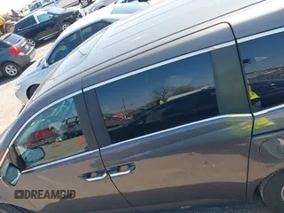 2013 Honda Odyssey EX-L with VIN 5FNRL5H65DB011071, listed as a IAAI auction lot 41992265 with 192,624 mi miles and . Bid and sale history available at DreamBid. Image 14.