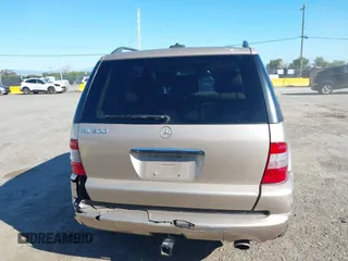 2002 Mercedes-Benz M 320/430/500 with VIN 4JGAB75E42A322824, listed as a IAAI auction lot 41871249 with 203,845 mi miles and . Bid and sale history available at carsss.com. Image 16.