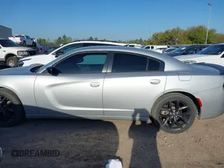 2021 Dodge Charger SXT with VIN 2C3CDXBG0MH562538, listed as a IAAI auction lot 41877128 with 54,934 mi miles and . Bid and sale history available at DreamBid. Image 14.