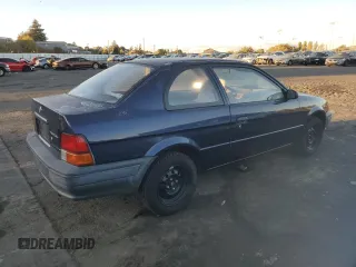 1996 Toyota Tercel DX z VIN JT2AC52L5T0190097, wystawiony jako Copart lot #76574844 z przebiegiem 175 256 mil mil oraz Tytuł czysty. Historia ofert i sprzedaży dostępna na DreamBid. Obrazek 3.