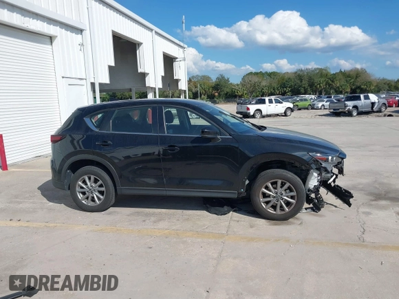 2023 Mazda CX-5 2.5 S with VIN JM3KFBAM3P0104813, listed as a IAAI auction lot 41540923 with 30,861 mi miles. Bid and sale history available at carsss.com. Image 14.