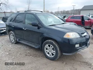 2005 Acura MDX Touring with VIN 2HNYD18945H514351, listed as a IAAI auction lot 41688097 with 323,000 mi miles. Bid and sale history available at carsss.com. Image 1.