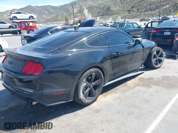 2021 Ford Mustang GT z VIN 1FA6P8CF4M5149580, wystawiony jako IAAI lot #41878355 z przebiegiem 60 028 mil mil oraz . Historia ofert i sprzedaży dostępna na DreamBid. Obrazek 4.