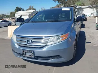 2012 Honda Odyssey EX-L with VIN 5FNRL5H69CB003067, listed as a IAAI auction lot 41862591 with 163,158 mi miles and . Bid and sale history available at carsss.com. Image 6.