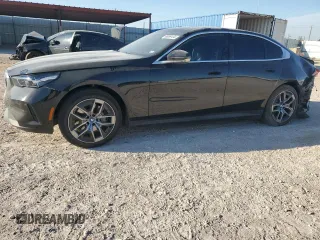 2024 BMW i5 eDrive40 with VIN WBY33FK05RCR36243, listed as a Copart auction lot 68999104 with 5,726 mi miles and Salvage Title. Bid and sale history available at carsss.com. Image 1.